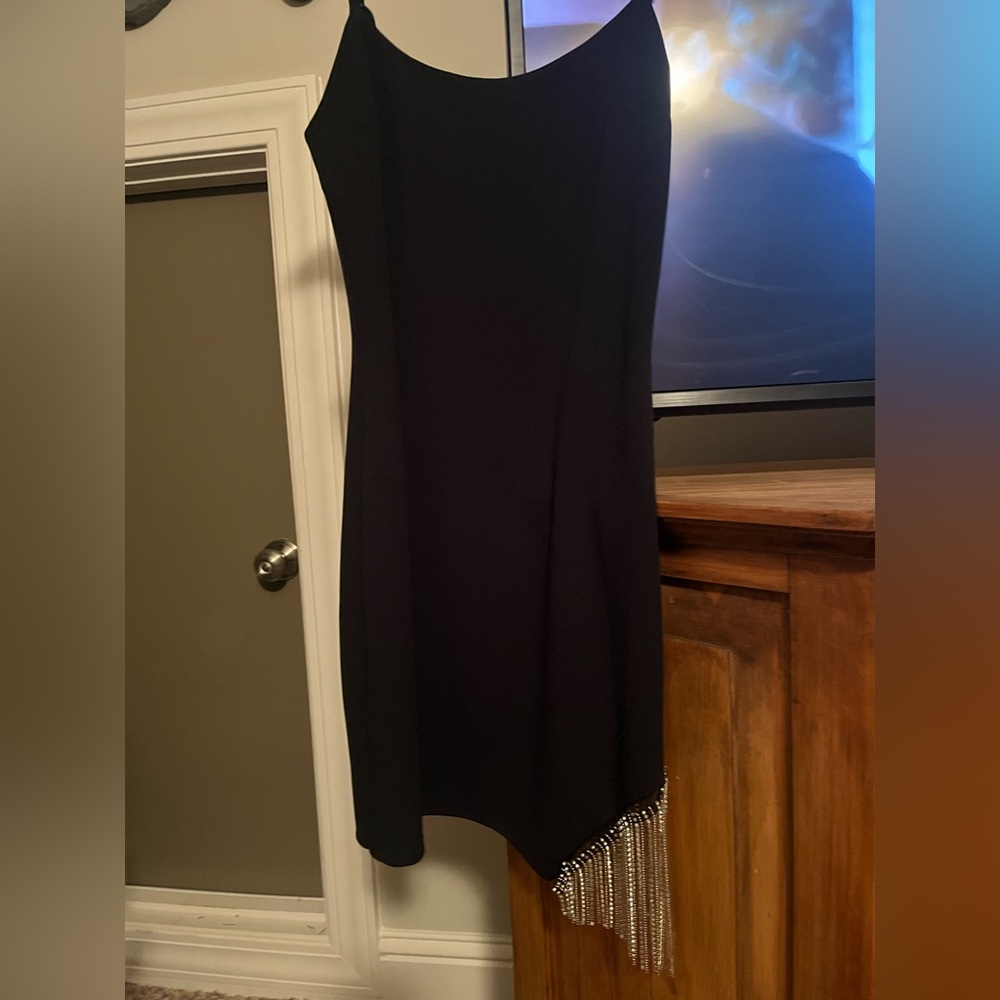 Black mini dress, with sequin fringe slit